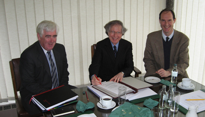 Signing the Minutes: Cecil Keaveney, Registrar; Arthur Jaffe, Chairman; Tony Dorlas, Director